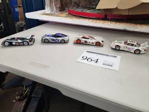 lot 964 image: Lot of (4) Slot Cars 132  - #74 Porsche, #17, #91, #78 by Carrera