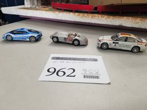 lot 962 image: Lot of (3) Slot Cars 132  - BMW 320si #2 J. Muller by Hornby, #722 Mercedes by Carrera Evolution, Lamborghini Huracan LP610-4 by Carrera