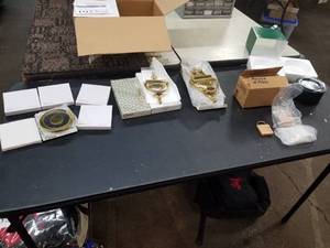 lot 1022 image: Lot of Engravables  - Brass Coasters (x6), Door Knocks (x3), Acrylic Locks (x6), Set of 4 Onyx Coasters