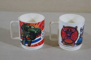 lot 149 image: Vintage Plastic Cups - He-Man, GI Joe