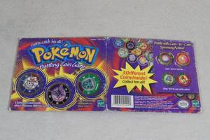 lot 21 image: Vintage Pokemon Battling Coin Set