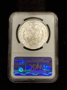 1885-O MORGAN DOLLAR MS63 NGC