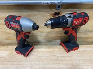 lot 23 image: MILWAUKEE M18 12 DrillDriver (2806-20) and 14 Hex Impact Driver (2656-20) (Tool Only)