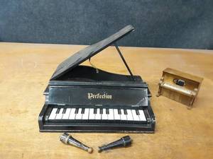 lot 1013 image: Perfection Mini Grand Piano (14 x 13) Missing 1 Leg, and Music Box Player Piano