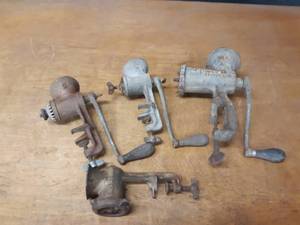 lot 1055 image: Lot of (4) Vintage Meat Grinders - Some Missing Parts - Maid of Honor, Universal and Enterprise