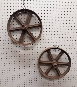 lot 1115 image: Pair of Matching Cast Iron Wheels - about 12 Diameter x 2 Wide