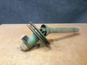 lot 1126 image: John Deere Pulley w Shaft - Unsure of application - cast in the pulley is H10586-H