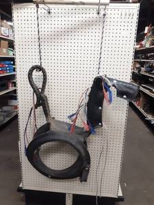 lot 1127 image: Homemade Vintage Horse Swing, made from an old tire About 34 x 30 x 12