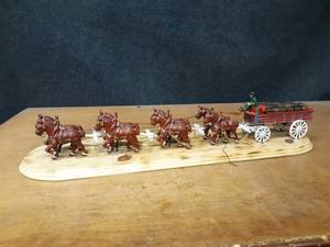 lot 1009 image: Cast Iron Team of Horses Pulling Wagon - Overall about 34 Long