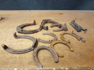 lot 1186 image: Lot of Antique Horseshoes, Railroad Spikes and Nails