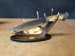 lot 1198 image: Eagle Bowie Knife w Stand - Overall about 15 Long