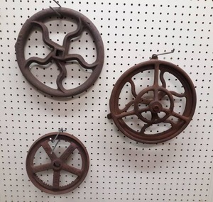 lot 1348 image: Lot of (3) Antique Cast Iron Wheels - Largest Diameter is about 12