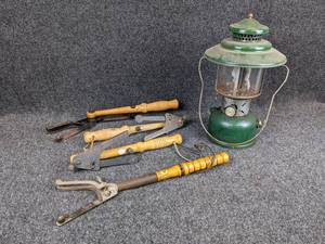 lot 1247 image: Coleman Lantern (6 diameter x 15 tall) and Vintage Clay Pigeon Throwers