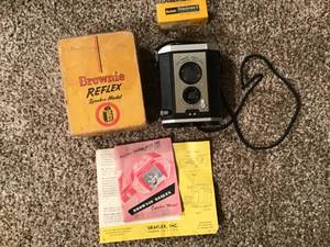 lot 643 image: Brownie Reflex Synchro Model Camera and Brownie Flasholder within Antique Camera Case