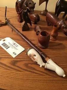lot 635 image: Hand Carvings from Journeys Around World - Set 2 with peace pipe