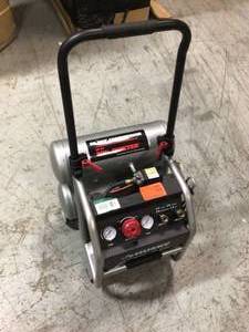 lot 15 image: Husky  4.5 Gal. Portable Electric-Powered Silent Air Compressor in good condition