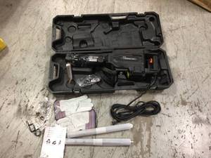 lot 21 image: TR Industrial 13 Amp 35 lbs. Demolition Jack Hammer in good condition see pictures