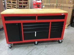 lot 34 image: Milwaukee High Capacity 52 in. 11-Drawer Tool Chest Mobile Workbench with Clamp-Ready Wood Top not used see pictures