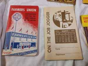 lot 49 image: 10 Vintage Farm Products Pocket Ledgers including 4-Seed Corn, Lindsay Bros., Farm OYL