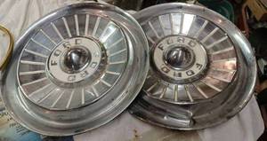 lot 59 image: Two Vintage Ford Hubcaps, a New Package of Napa Pickup CamperTopper Tape