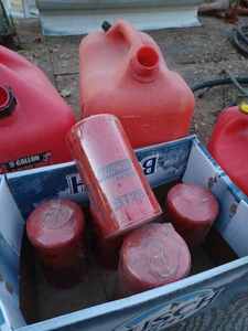 lot 70 image: Five New Baldwin Diesel Fuel Filters - SF888 and 4-BT261s, and 4 Assorted Plastic Gas Cans
