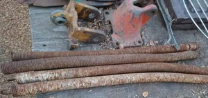 lot 73 image: Eight Oliver Disk Blade Spacers, Assorted Cultivator Shovels, Old Plow Share, Center Link from Case