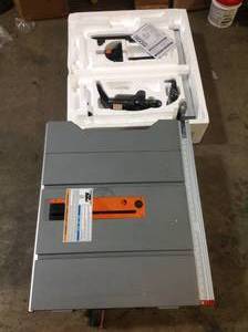 9 Amp Corded 7 in. Wet Tile Saw with Stand by RIDGID Customer Returns See Pictures