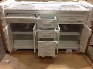 Windlowe 61 in. W x 22 in. D x 35 in. H Bath Vanity in White with Carrera Marble Vanity Top in White with White Sink by Home Decorators Collection Broken on Granite See Pictures