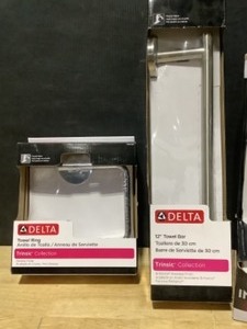 lot 22 image: Delta Towel Ring, Towel Bar & Shower Head. See Pictures