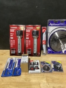 lot 61 image: Husky Flashlights, String Lights & Bosh, Avanti & More Saw Blade And Attachments. See Pictures