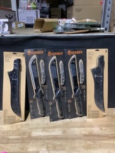 lot 66 image: Gerber Machete & Pocket Knife Sets. See Pictures