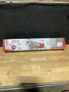 lot 75 image: Rubi 26 in. Star Max Tile Cutter. See Pictures