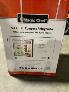 lot 83 image: Magic Chef 4.4 cu. ft. Mini Fridge in Black. See Pictures