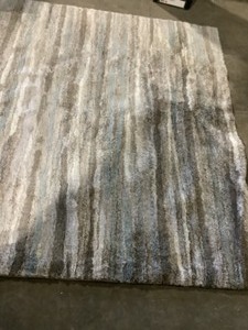 lot 87 image: Home Decorators Collection Shoreline Multi 8 ft. x 10 ft. Striped Area Rug. See Pictures