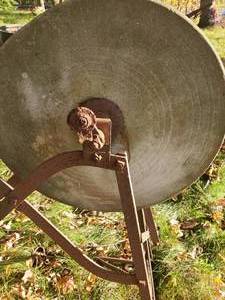 lot 11 image: Antique Grinding Wheel With Sharpening Stone