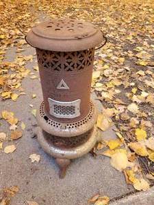 lot 21 image: Vintage Perfection smokeless oil heater