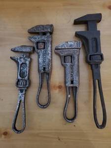 lot 57 image: Four Vintage Pipe Wrenches