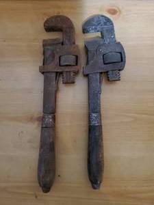 lot 60 image: Two Vintage Wood Handled Pipe Wrenches