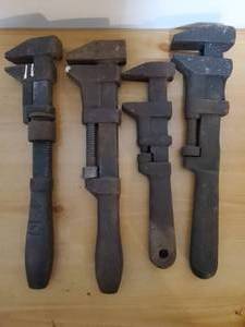 lot 113 image: Four Vintage Pipe Wrenches