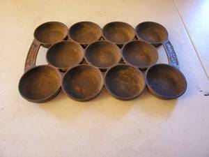 lot 283 image: Antique N. Waterman Cast Iron Muffin Pan