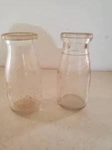 lot 379 image: Two Vintage Milk Bottles