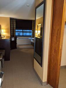 lot 58 image: Room 1411. 2 Full Beds, TV 42 LG, Small Safe, Bathroom Accessories, Wall Mirrors, Light Bar, Night Stands, Etc. 