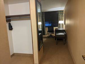 lot 11 image: Room 1609. 2 Full Beds, Marble Circle Nightstand, TV 42 LG, Small Safe, & More