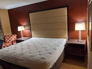 lot 13 image: Room1614. King Bed, 42 LG TV, Headboard, Desk, Small Safe, and More
