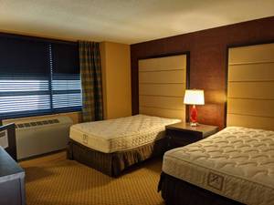 lot 88 image: Room 1201. 2 Full Beds, Mini Fridge, Pedestal Sink, TV 42 LG, Small Safe, & More