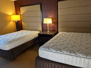 lot 91 image: Room 1202. 2 Full Beds, Flatscreen 42 LG, Small Safe, Bathroom Accessories, and More