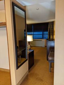 lot 129 image: Room 1121. King Bed, Mini fridge, TV 42 LG, Small Safe, & More