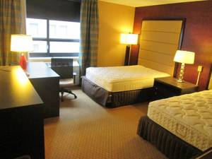 lot 158 image: Room 908. Handicap Accessible Room - 2 Full beds, Floor Lamp, LG TV, and more