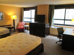 lot 160 image: Room 909 2 Full beds, Marble Circle Nightstand, Luggage Bench, and more