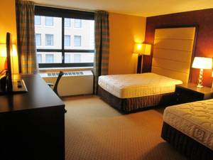 lot 137 image: Room 1008. 2 Full Beds, TV 42 LG, Small Safe, Bathroom Decor, and More 